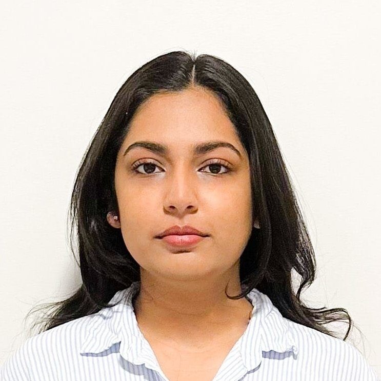 A headshot of Deepti Mannem, Communication Health Assistant at Granville Island Speech. She stands against a white background.